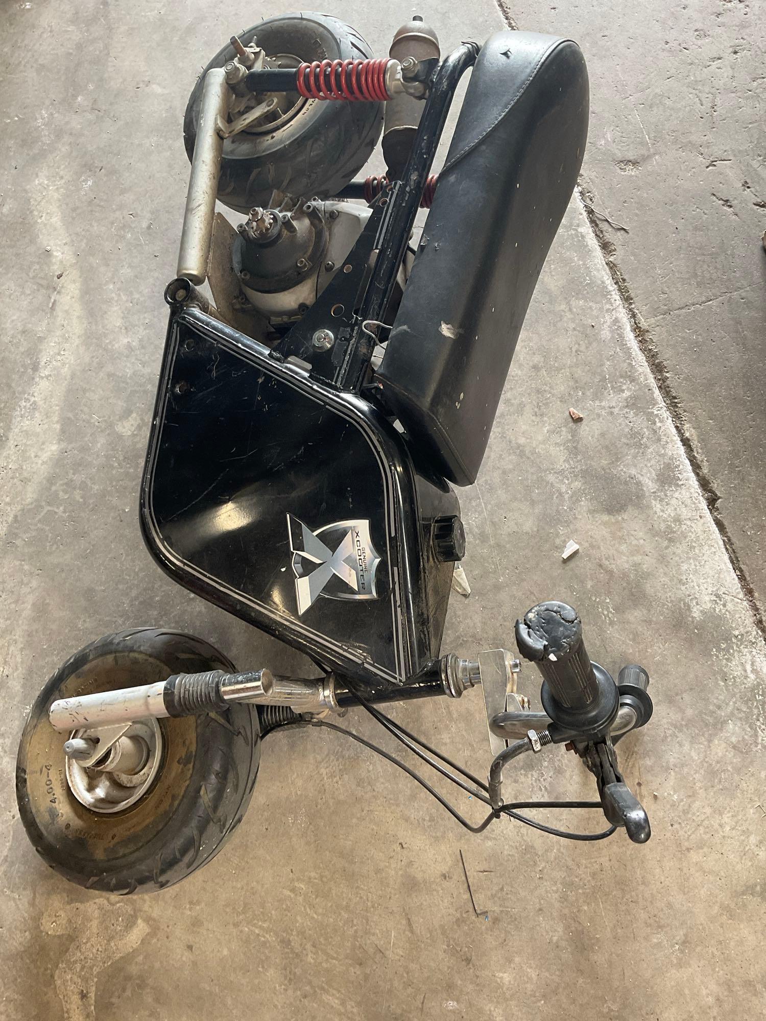 Untested mini bike, emblems are from Genuin Xcooter