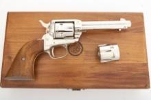 Cased Colt SA Frontier Scout Revolver, .22 caliber with extra cylinder, SN 25438K, factory nickel fi