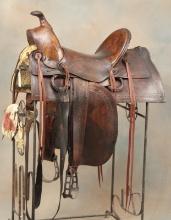 Very desirable early, lightly tooled square skirt Saddle with A-Fork, 14" seat, 4 1/2" cantle, with