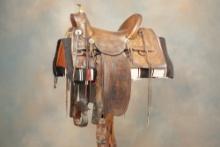 Exceptional "R.T. Frazier" marked tooled Saddle, showing maker mark 5 times, 15" seat, 4" cantle, br