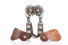 Pair of  single mounted engraved overlay Spurs, Cheyenne, Wyoming style with split heel bands, multi