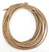 Fine braided rawhide Reata, approximately 50 ft. long with leather Hondo. Very good condition.