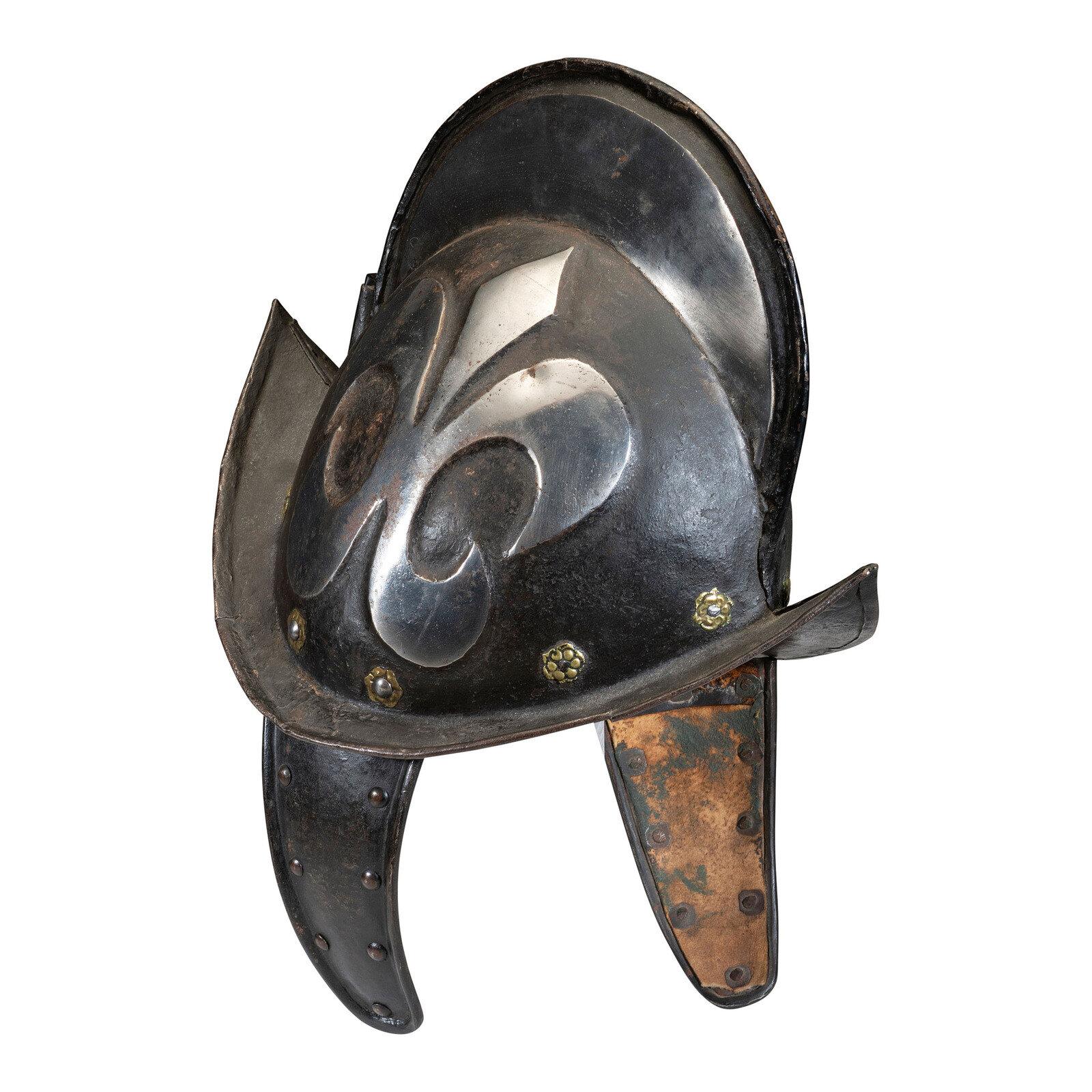 A German Black and White Comb Morian Helmet with Ear Flaps