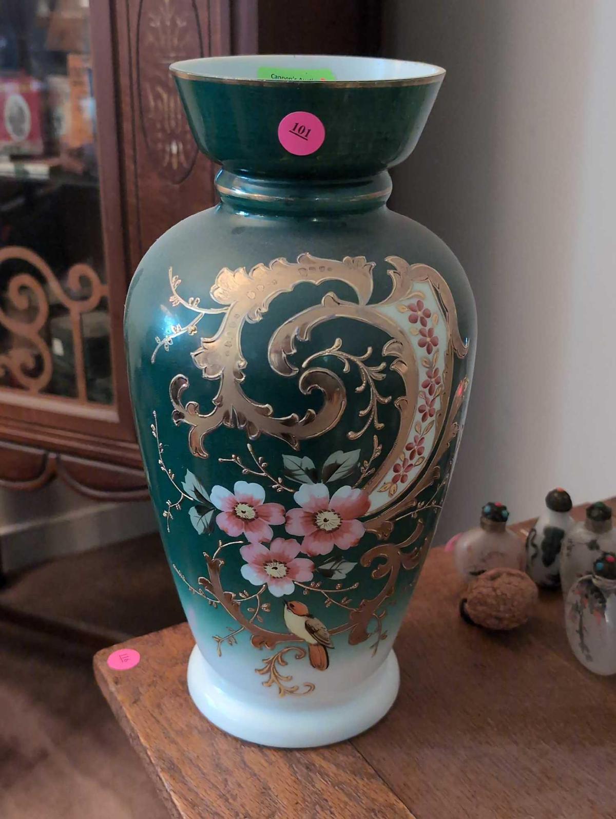 (LR) VINTAGE PAINTED MILK GLASS ORIENTAL DETAILED FLOWER VASE. FEATURING A MAIN GREEN COLOR WITH