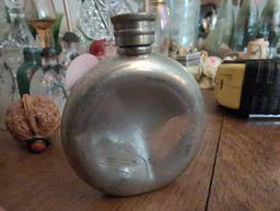 (LR) SM. BOWMORE PEWTER SCOTCH WHISKEY FLASK. SLIGHTLY BENT. MEASURES 3-1/4"T.
