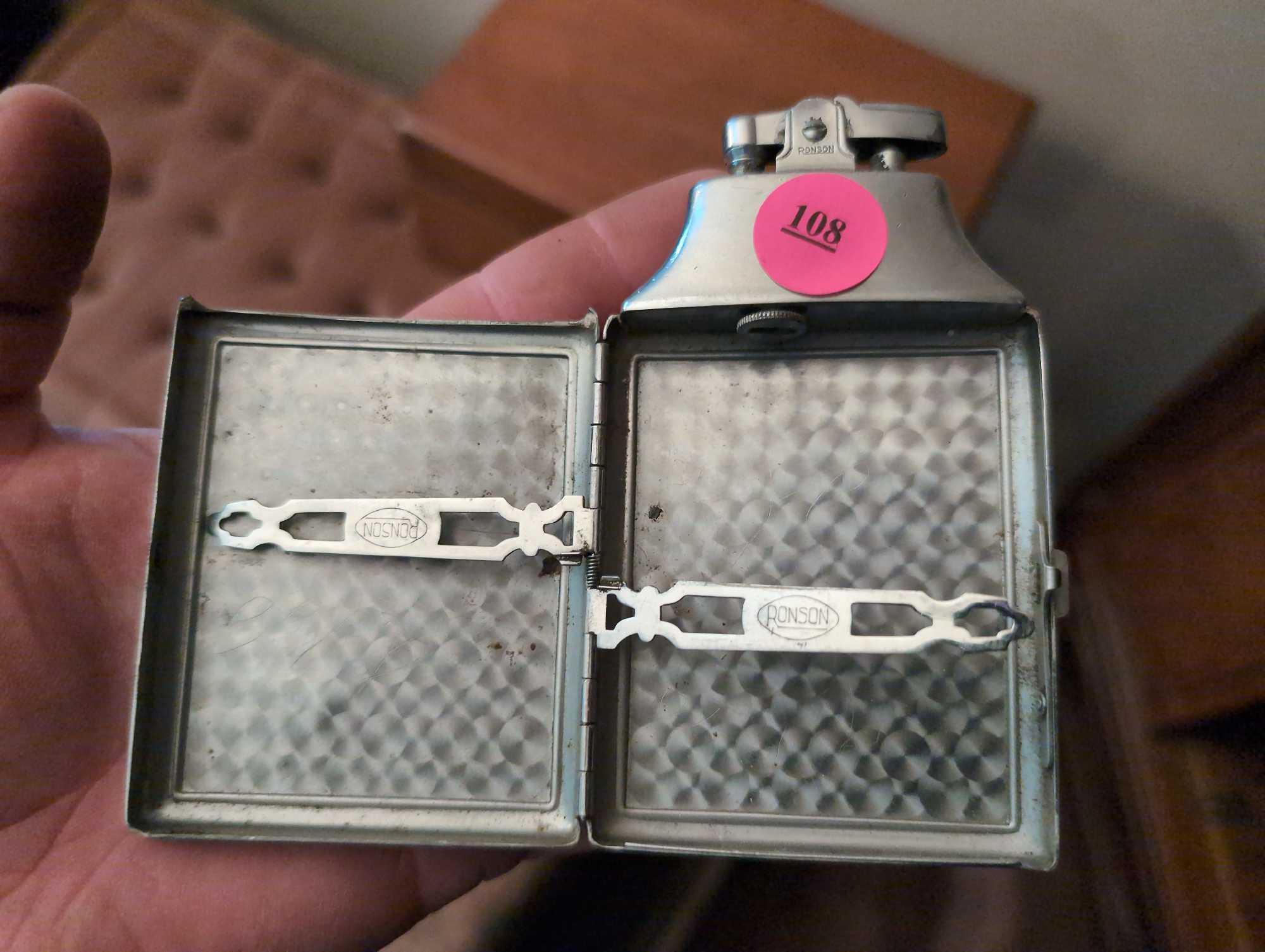 (LR) LOT OF (4) VINTAGE SILVER-PLATE LIGHTERS. ONE IS ALSO A CIGARETTE CASE.