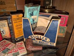 (LR) SHELF LOT OF VINTAGE COLLECTIBLE TOBACCO ITEMS TO INCLUDE AN ASSORTMENT OF TOBACCO TINS, (2)