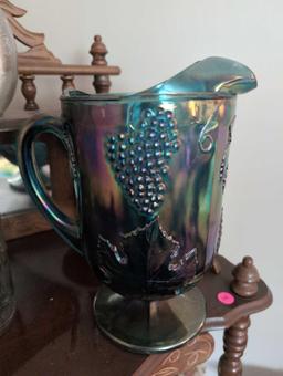 (LR) INDIANA IRIDESCENT BLUE CARNIVAL GLASS PITCHER. MEASURES 10-1/4"T.