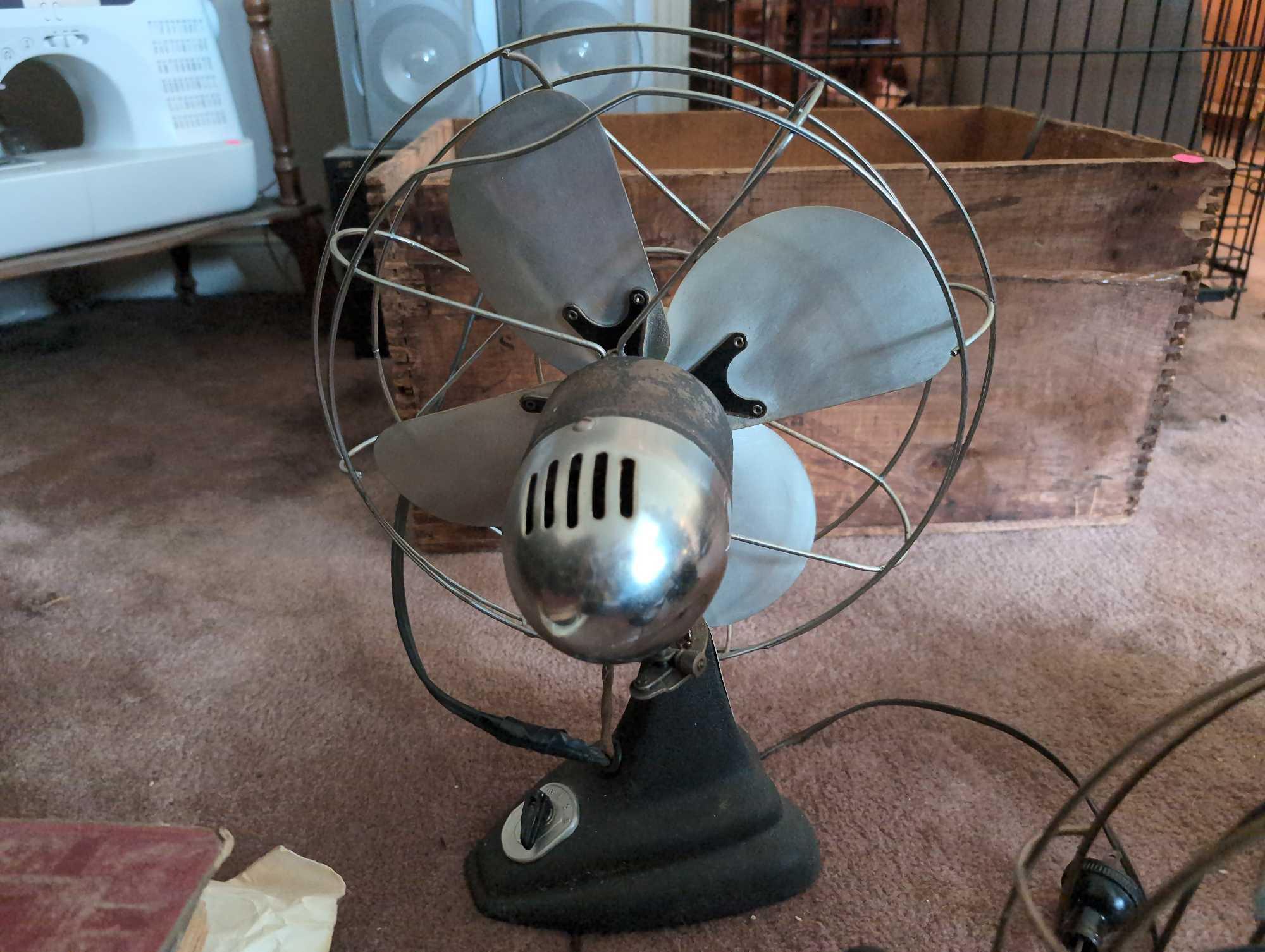(LR) LOT TO INCLUDE: A VINTAGE ROBBINS & MYERS METAL ELECTRIC FAN, VINTAGE DOMNICK ELECTRIC METAL