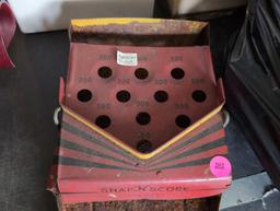 (LR) ANTIQUE SNAP 'N' SCORE TIN MARBLE GAME BY WOLVERINE SUPPLY & MFG. INC. DISPLAYS RUST. 22"L X