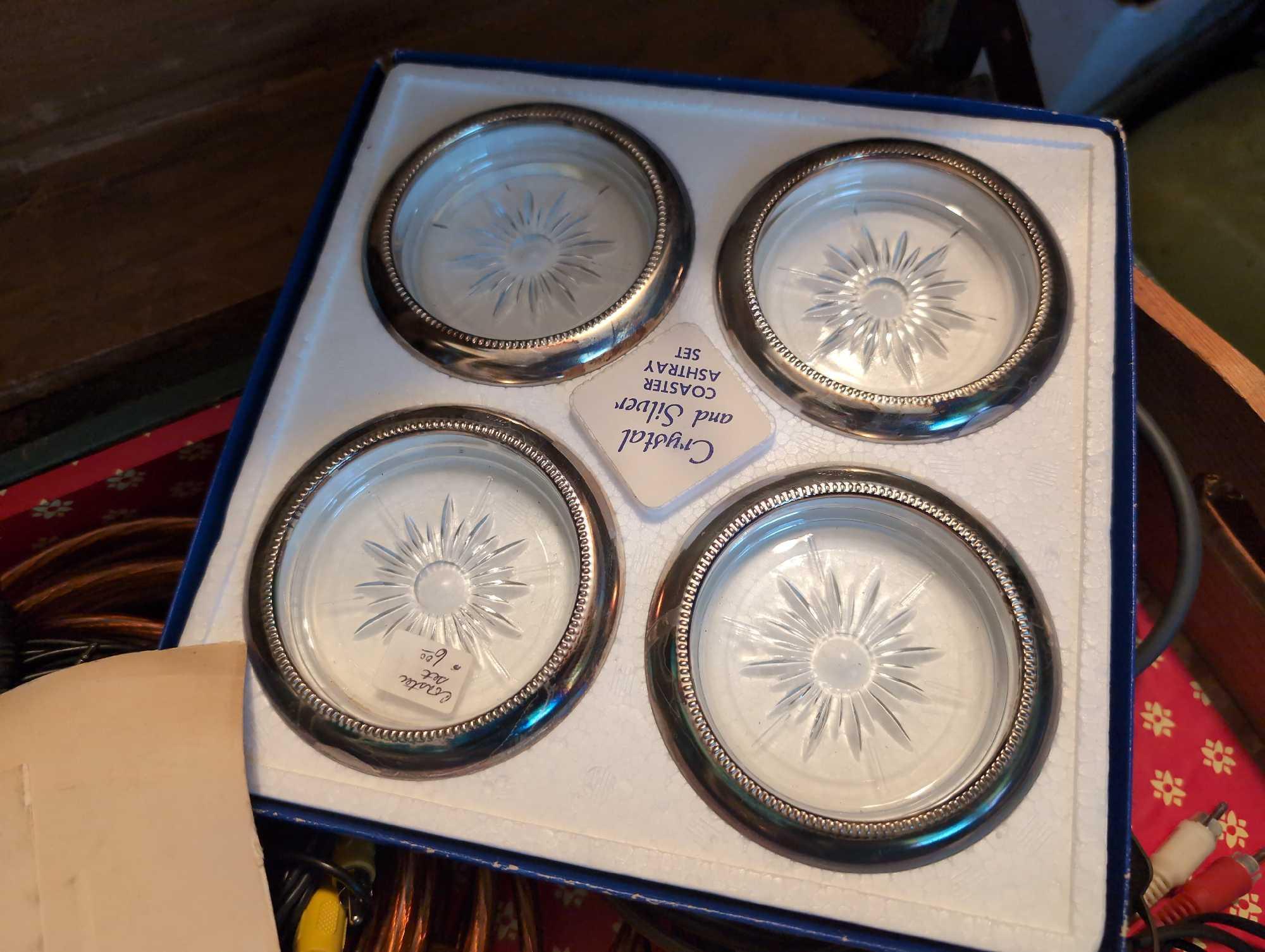 (BR2) CONTENTS OF TRUNK TO INCLUDE (2) SETS OF 4 SILVERPLATE RIMMED GLASS COASTERS, SAN(DR)O