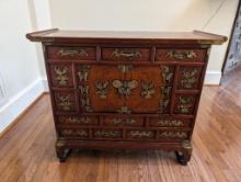 LATE 19TH CENTURY KOREAN BRASS ACCENTED TANSU CABINET. FEATURING MULTIPLE DRAWERS AND SINGLE