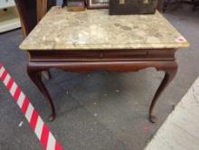 Marble top end table with extendable table top space drawer. Comes as a shown in photos. Appears to