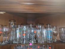 Shelf Lot of Assorted Glasses Including Wine Glasses, Beer Mugs, Tulip Glasses, Etc...What You See