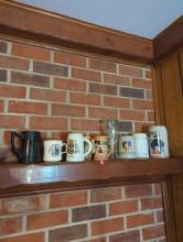 (LR)LOT OF VARIOUS BEER MUGS AND 1 GLASS. ALL ARE OF VARIED SIZES, THE TALLEST IS 9 1/2" AND THE