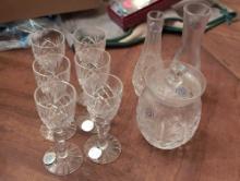 (DR) LOT OF (9) PIECES OF WEDGEWOOD IRISH CRYSTAL TO INCLUDE (2) BUD VASES, A CANDY JAR WITH LID, &