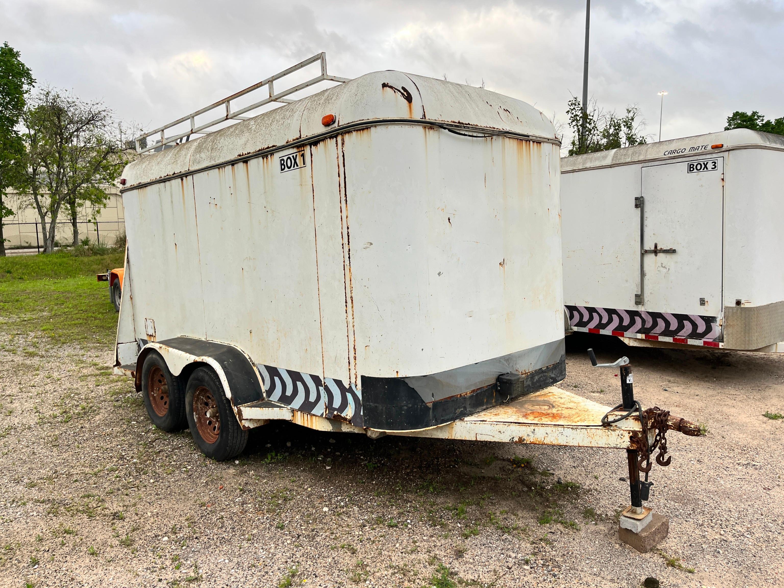 2003 CARGO TRAILER VN:5EMCS12203T000531...equipped with 12ft. Enclosed body, swing rear doors,