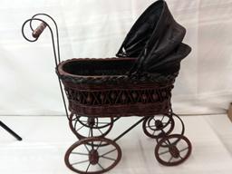 VINTAGE WICKER DOLL CARRIAGE 24" TALL 25"LONG WITH HANDLE PICK UP ONLY.