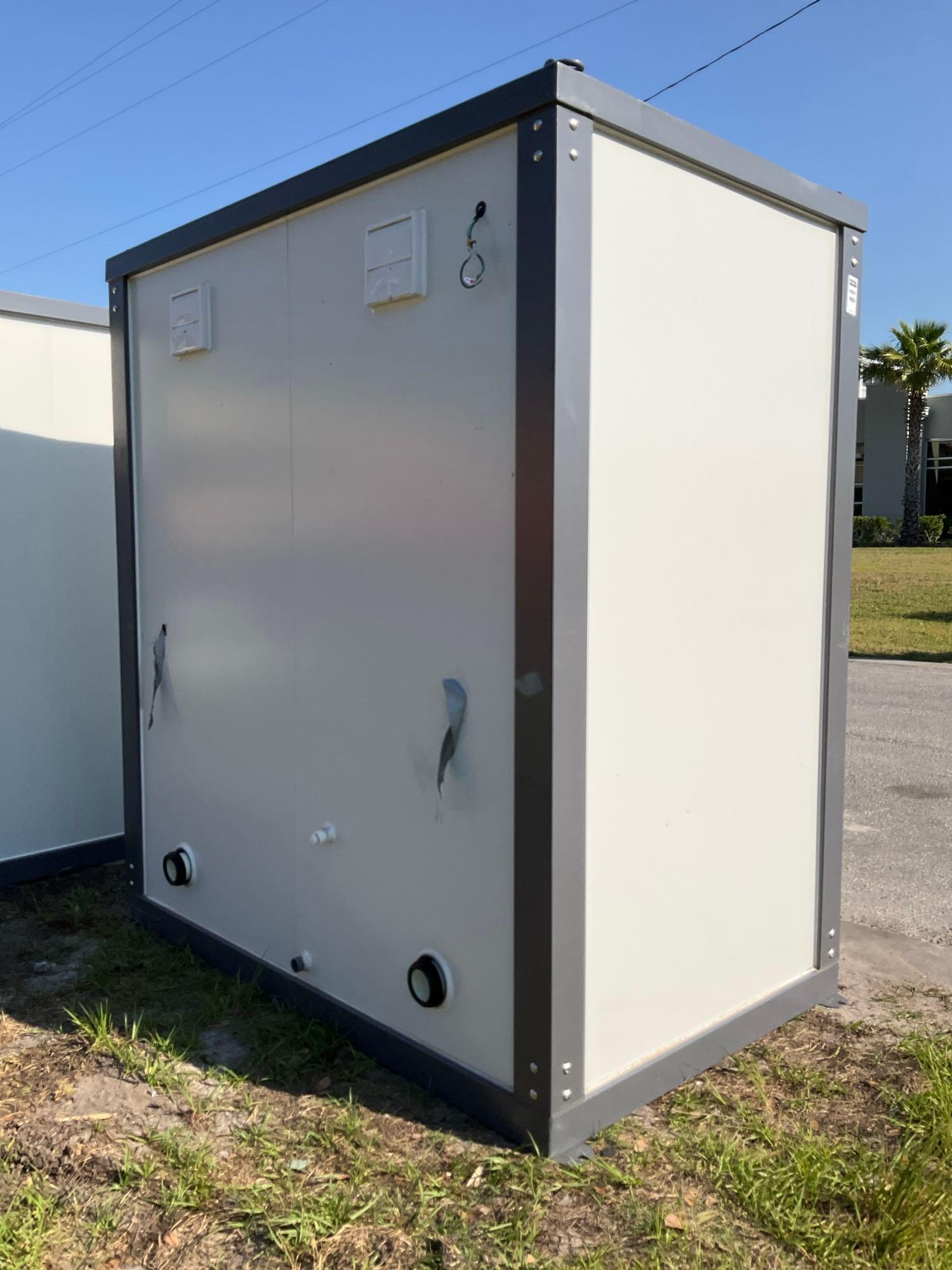 UNUSED PORTABLE DOUBLE BATHROOM UNIT, 2 STALLS, ELECTRIC & PLUMBING HOOK UP WITH EXTERIOR PLUMBING