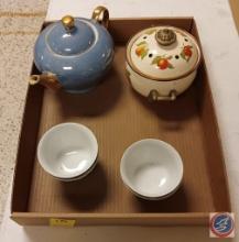 Tea pot, mugs, and bowl