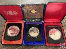 (3) Canadian silver dollars