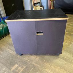 Rolling Particle Board TV Stand