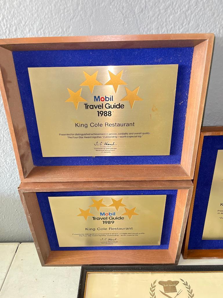 Group of King Cole Awards and Signs