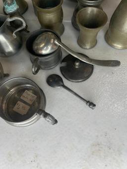 Large assortment of pewter pieces