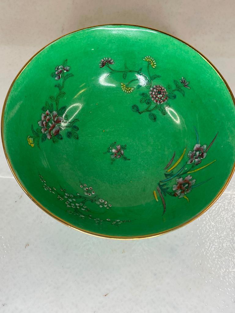 Green bowl with flowers