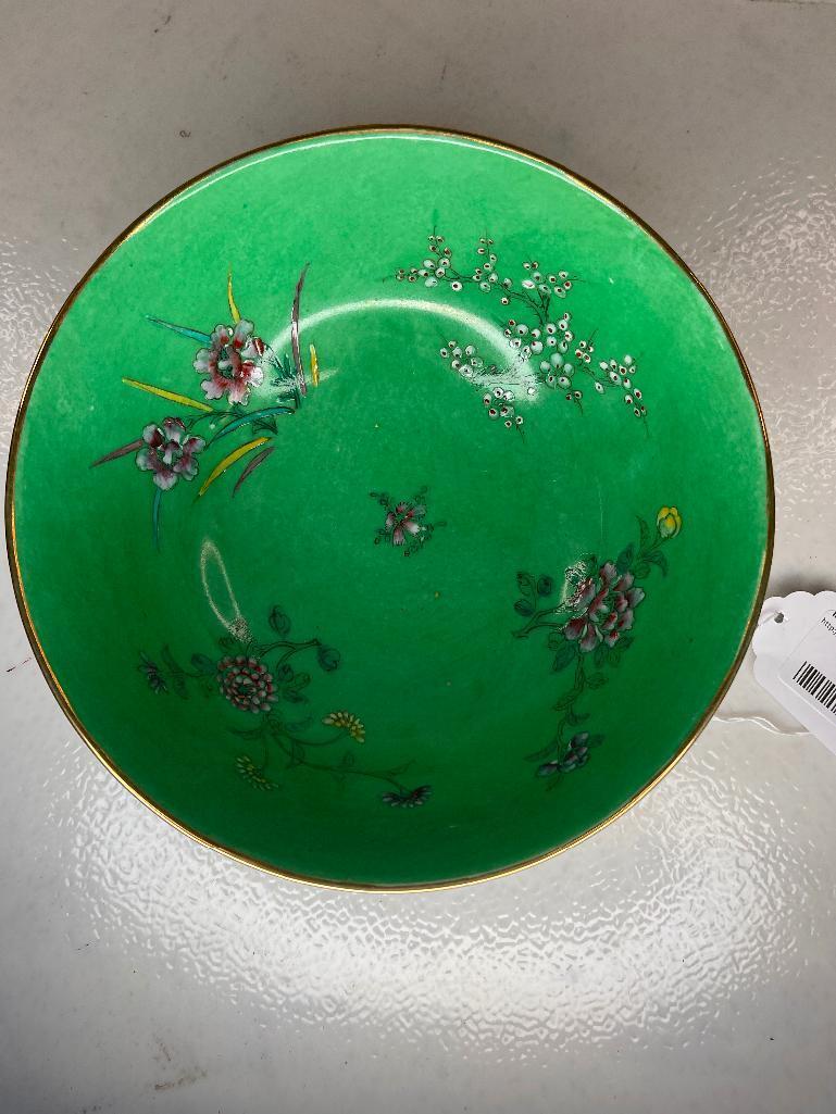 Green bowl with flowers
