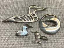 Four Sterling Silver Brooches