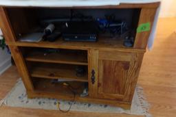 SMALL ENTERTAINMENT CENTER NATURAL FINISH WITH CONTENTS OF DVD PLAYER ETC