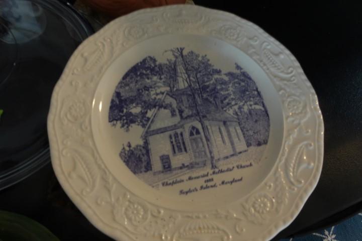 TABLE LOT INCLUDING MISC TAYLOR ISLAND METHODIST CHURCH PLATE COVERED DISH