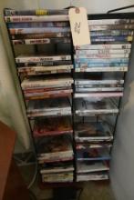 TWO RACKS APPROX 50 DVDS