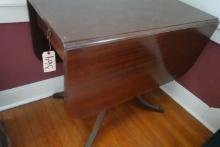 DROP LEAF MAHOGANY TABLE WITH BRASS CAP TOES AND SINGLE DRAWER WITH CONTENT