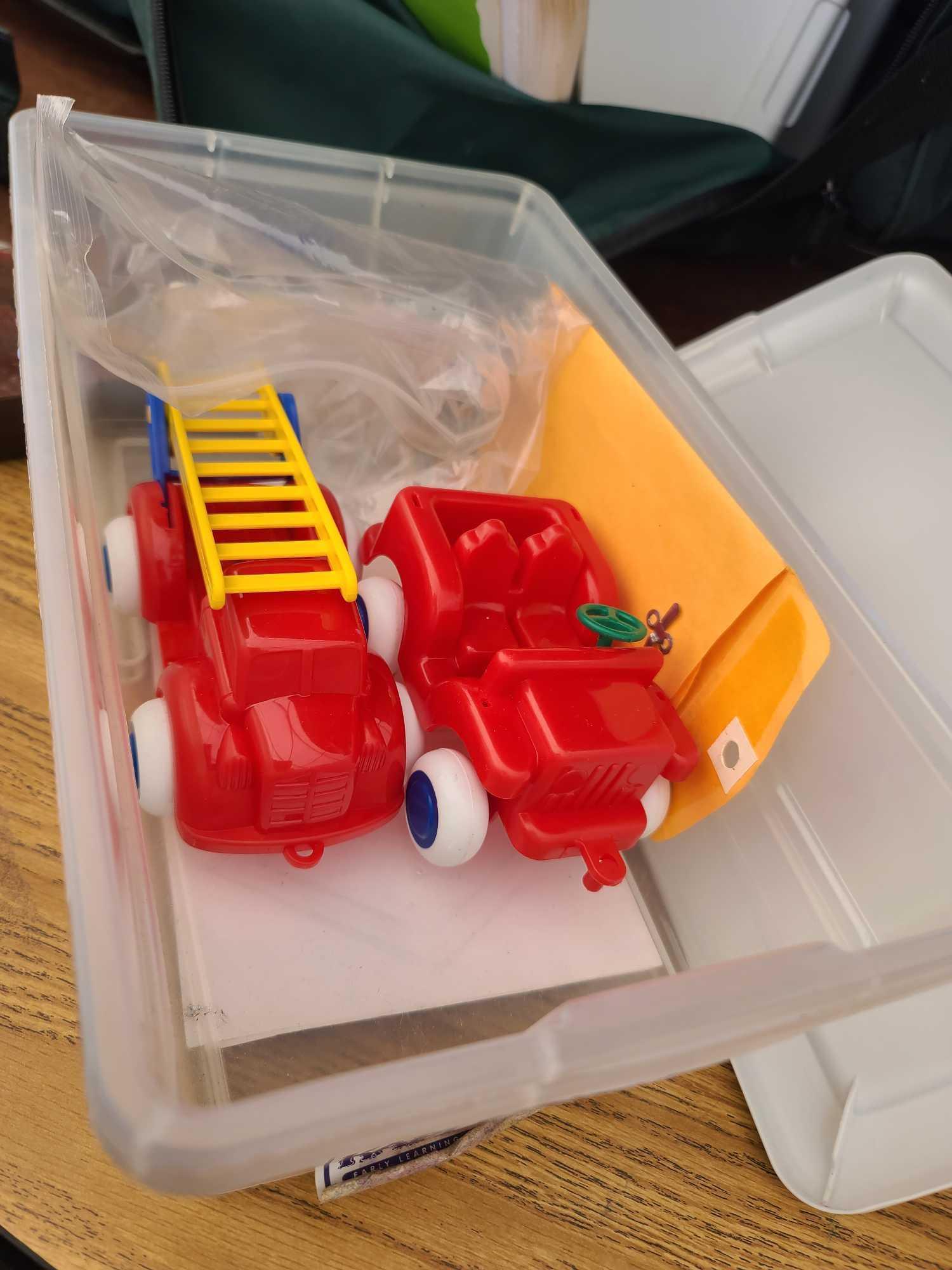 Group of Plastic Containers, Group of Building Blocks, (2) Red Toy Cars, (1) Silver Hand Bell, Plus