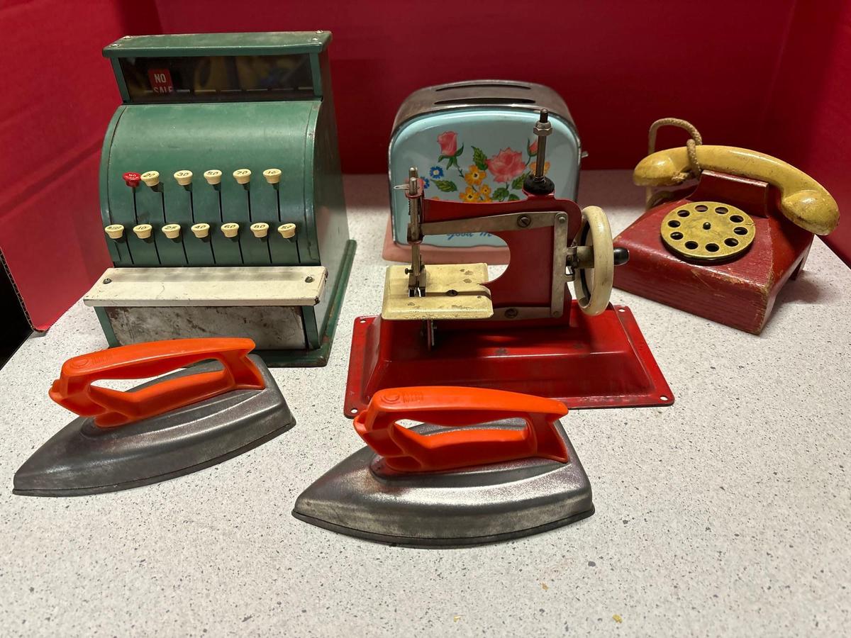 Tom Thumb toy cash register toy toaster?s phone sewing machines etc.