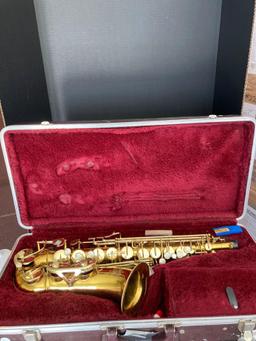 Antique king alto saxophone in case