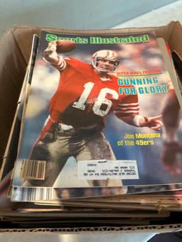 box full of vintage sports illustrated