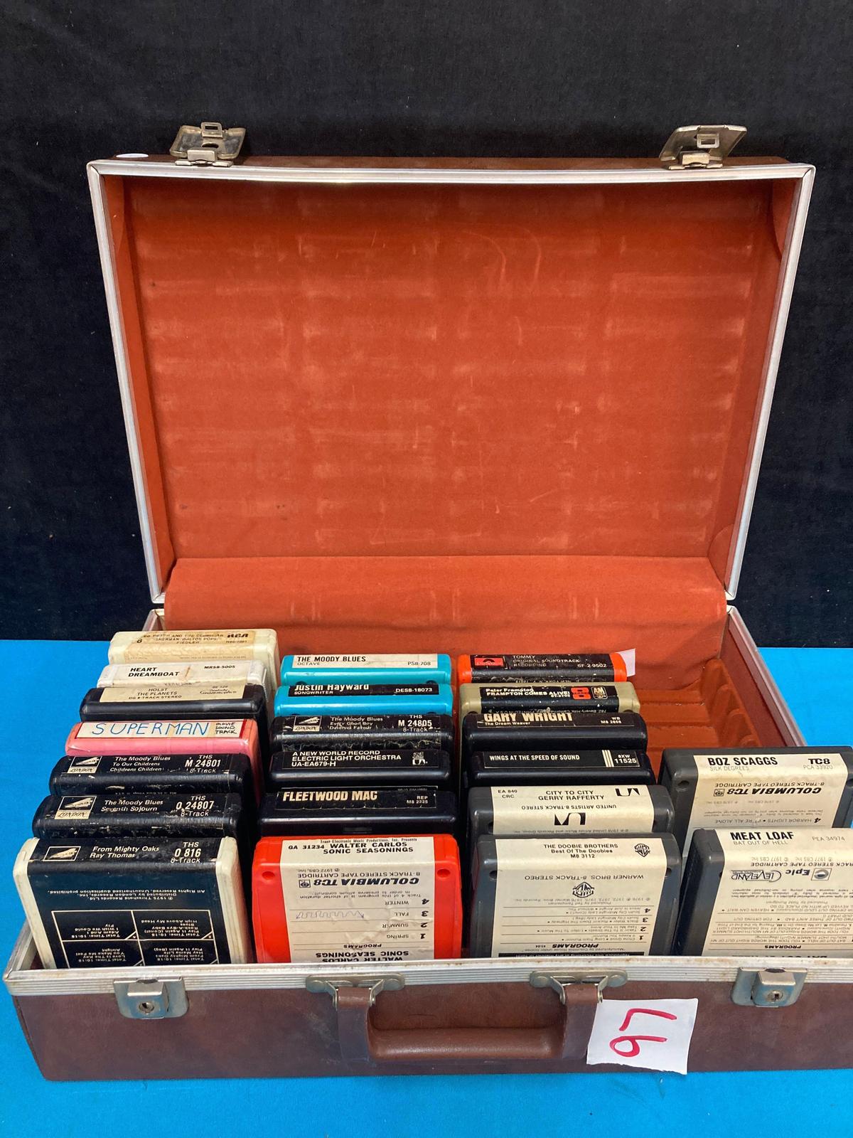 8 track cassette case full of cassettes