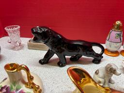 miniature black panther salt and pepper shakers some pieces glass water can