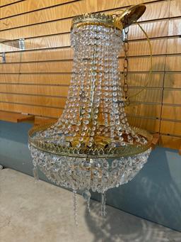 large hanging chandelier with glass prisms