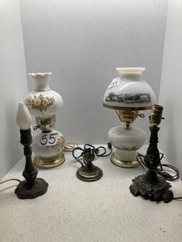 Two parlor lamps, one Currier and Ives, and three metal lamps