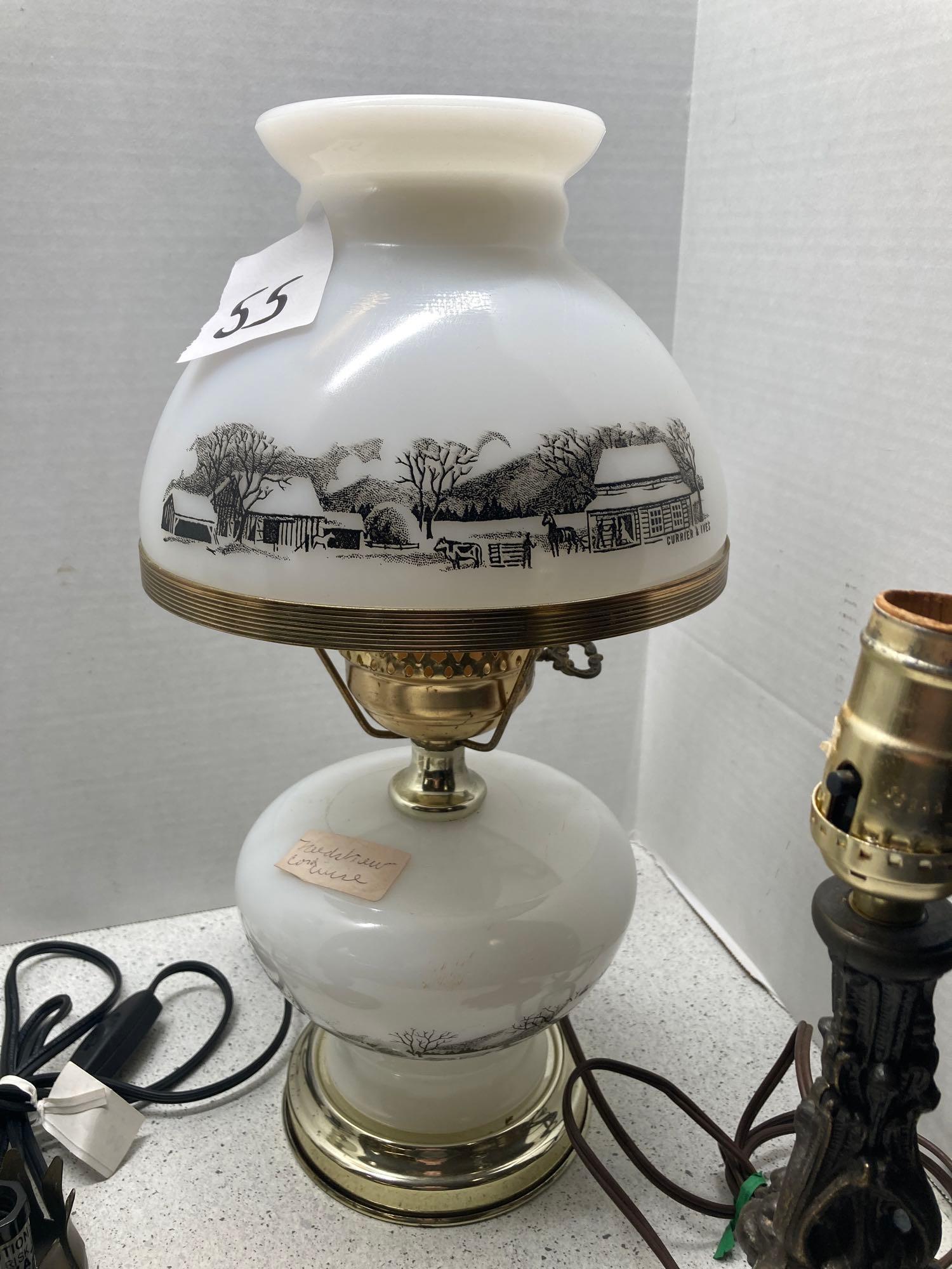 Two parlor lamps, one Currier and Ives, and three metal lamps