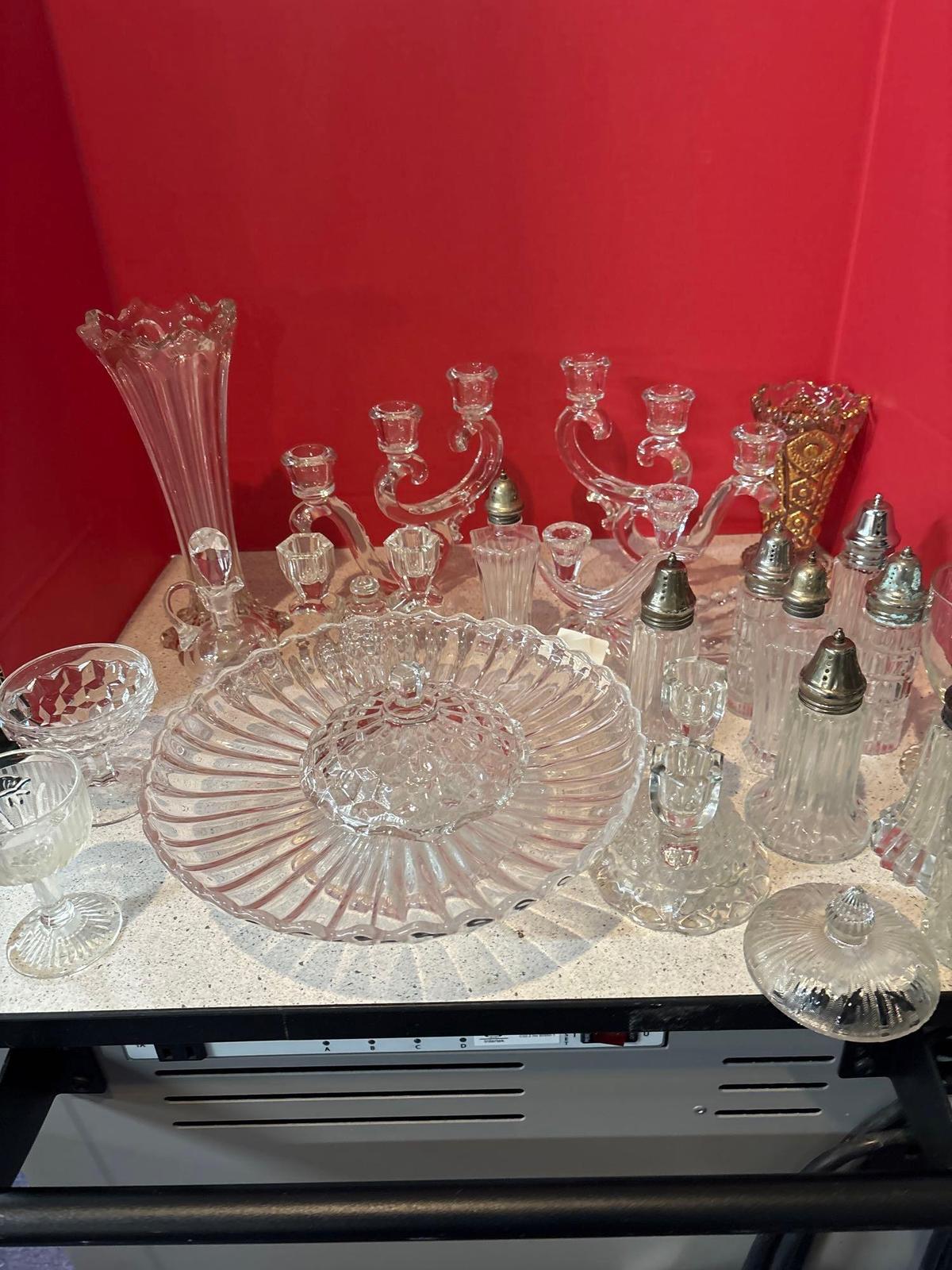 large lot of glass shakers candlesticks compote etc.