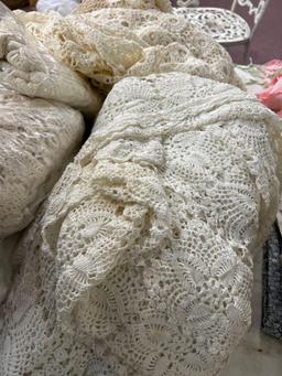 large collection of Quaker lace tablecloths