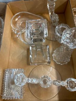 large collection of glass and crystal