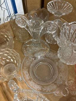 large collection of glass and crystal
