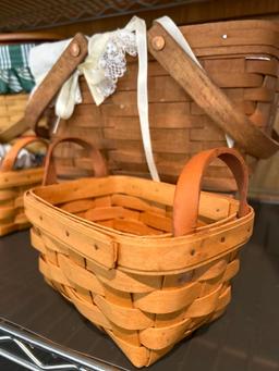 8 longaberger baskets some with lids and stands