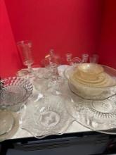 Glass platters covered dishes candlesticks servingware etc.